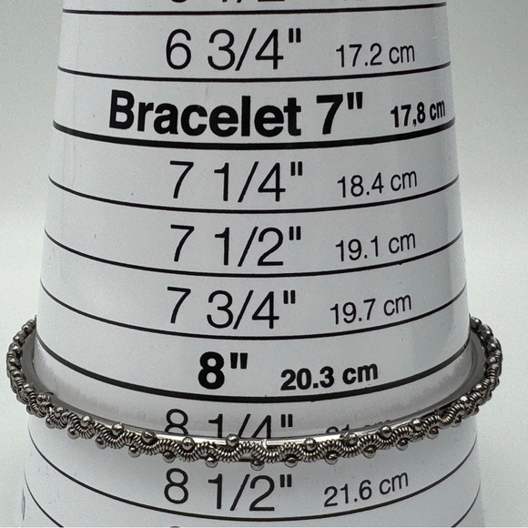 Set of 7 Silver Textured Bangle Bracelets 8.25” - Picture 3 of 4